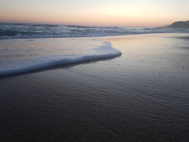 istock sunset sea waves and  foam splash  in summer Preveza Vrahos Greece 1010201066