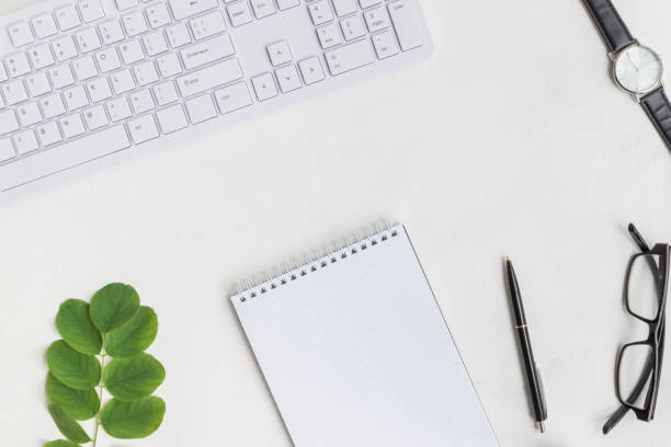 istock Blogger or freelancer workspace with notebook and green leaves 1010210768