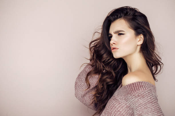 istock Beautiful woman wearing sweater 1010215352