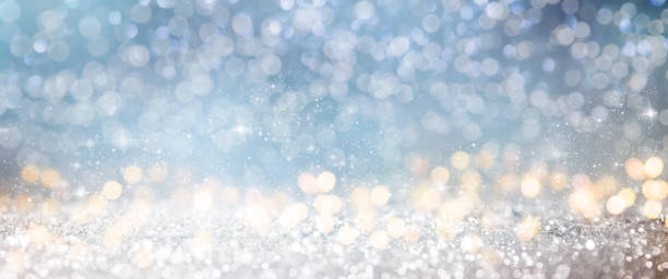 istock Christmas light background.  Holiday glowing backdrop. Defocused Background With Blinking Stars. Blurred Bokeh. 1010221428
