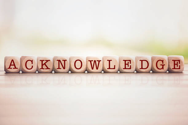 istock Acknowledge word written on cube wooden blocks. 1010227810