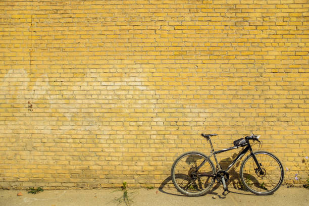 istock City Bicycle against the brick wall 1010231828