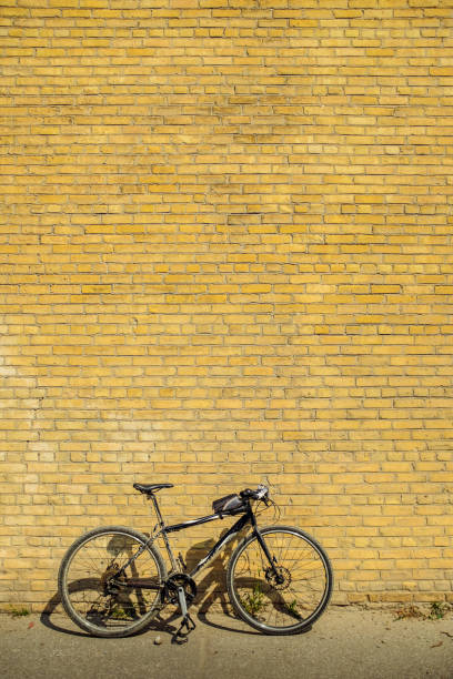 istock City Bicycle against the brick wall 1010231898