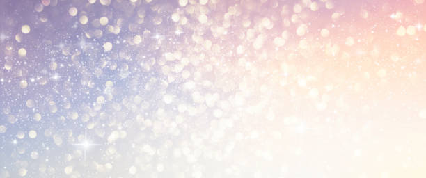 istock Christmas light background.  Holiday glowing backdrop. Defocused Background With Blinking Stars. Blurred Bokeh. 1010232472