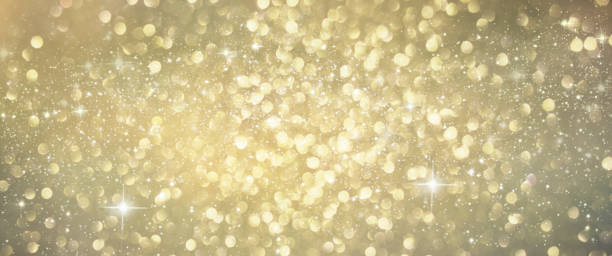 istock Christmas light background.  Holiday glowing backdrop. Defocused Background With Blinking Stars. Blurred Bokeh. 1010232580