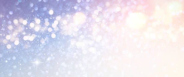 istock Christmas light background.  Holiday glowing backdrop. Defocused Background With Blinking Stars. Blurred Bokeh. 1010237092