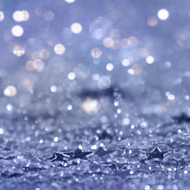 istock Christmas Background.  Holiday glowing Abstract Glitter Defocused Background With Blinking Stars. Blurred Bokeh 1010237882