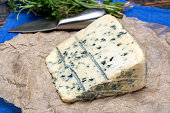 Blue cheese made from cow milk with Penicillinum mold, tasty soft cheese with specific odor