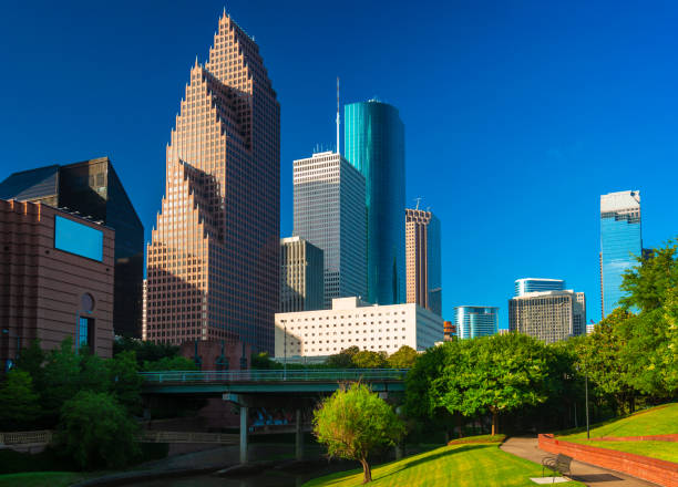 istock Houston Downtown Skyscrapers With Bayou and Park 1010253110