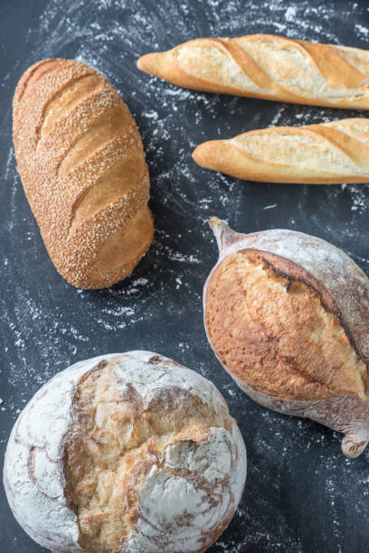 istock Different kinds of bread on the wooden background 1010253174
