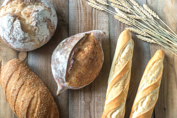 istock Different kinds of bread on the wooden background 1010253436