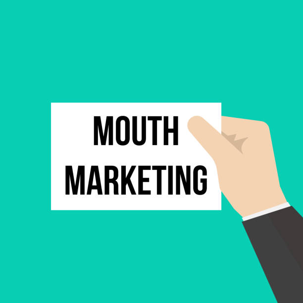 istock Man showing paper WORD MOUTH MARKETING 1010275640