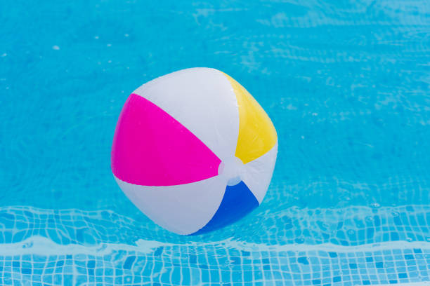 istock Colorful ball on water close up 1010281280