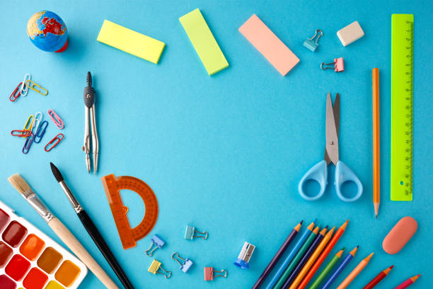 istock Back to school concept on blue texture paper background. 1010281944