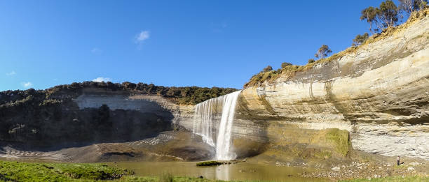 istock Spectacular waterfall cascade in the native forest 1010300854