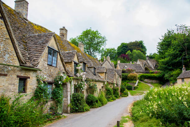 Picturesque English cottages Cotswold village Arlington Row stock photo