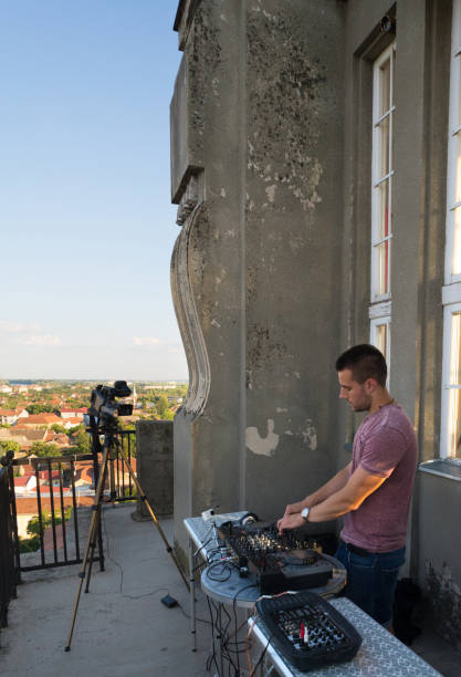 istock Dj playing music on the terrace 1010316828