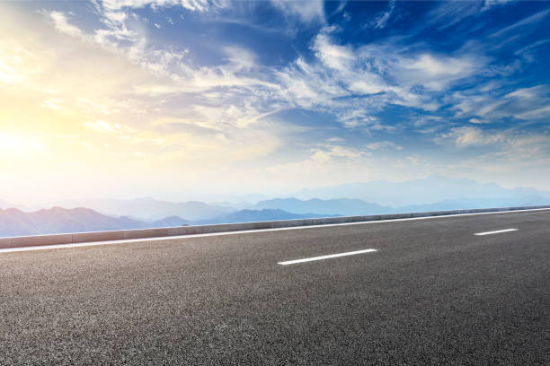 istock Asphalt road and mountains natural scenery at sunrise 1010316906