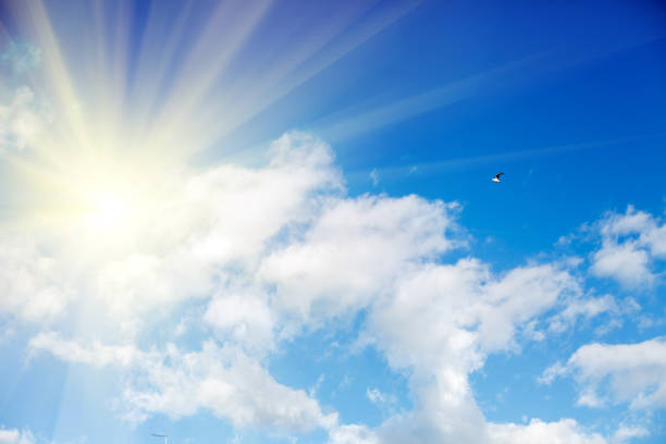 istock clouds against a blue sky with rays of the sun 1010326850