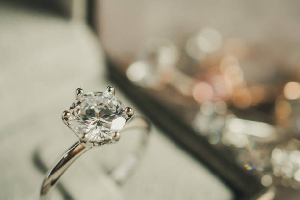 istock luxury engagement Diamond ring in jewelry gift box 1010329428