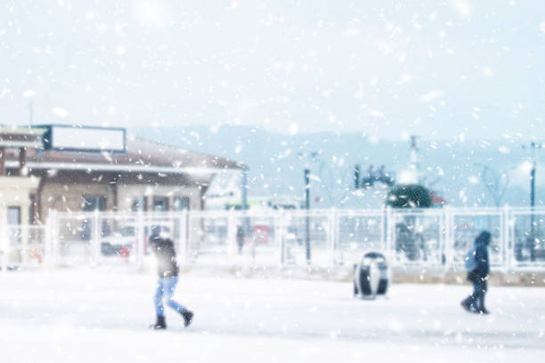 Blur snowy city background Blur snowy city background slippery unrecognizable person safety outdoors stock pictures, royalty-free photos & images