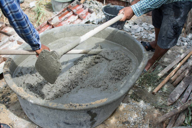 istock Mixing a cement in salver for applying construction 1010375400
