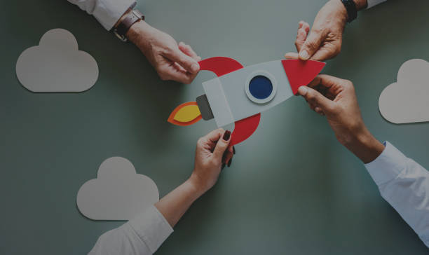 istock Business people with startup rocket 1010389476