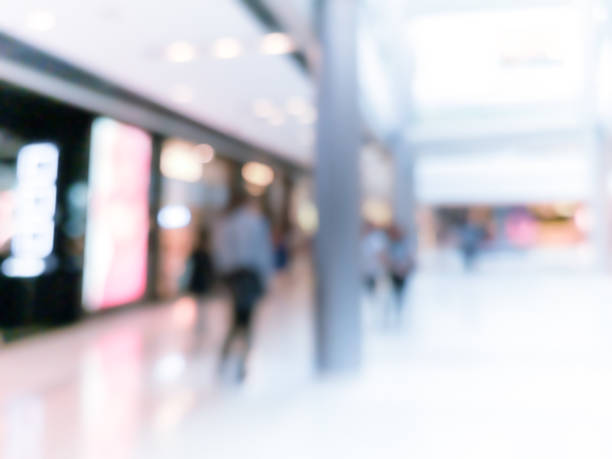 istock Abstract blur shopping mall interior and retail store for background 1010392360