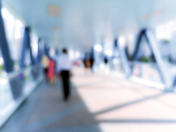 istock Abstract background of people walk on footbridge at rush hour 1010392472
