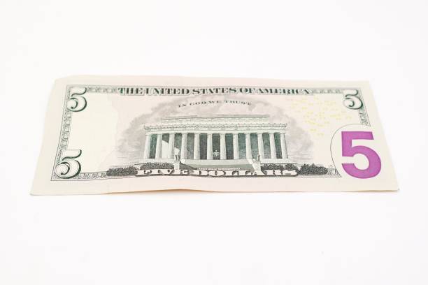 banconota in dollari usa - currency us paper currency five dollar bill usa foto e immagini stock