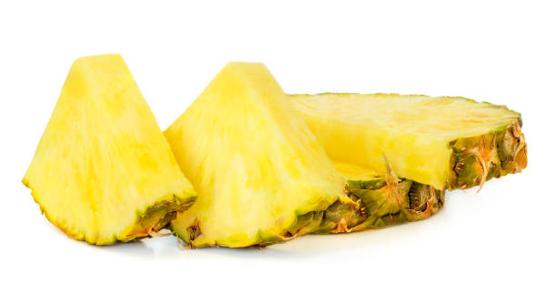 istock Sliced Pineapple  isolated on white background, macro. Fresh  Pineapple chunks. Summer tropical fruits close up 1010398140