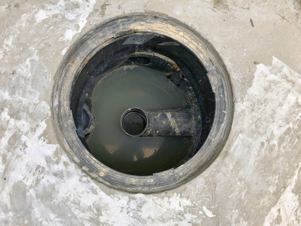 istock A hole of grease trap with the drain system around the house. 1010425444
