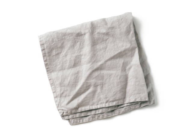 istock Gray linen napkin isolated on white 1010442948