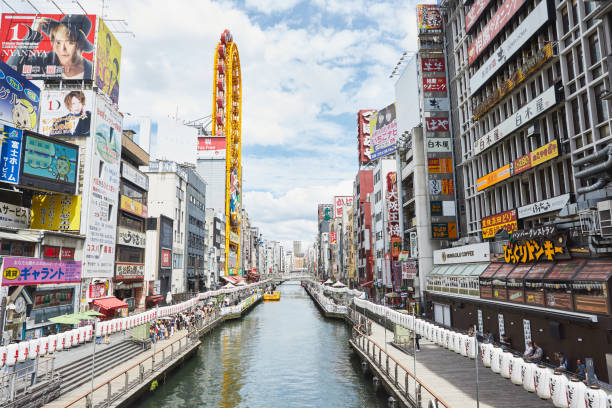 istock Osaka Dotonbori district signs and billboards. Canal view. 1010464262