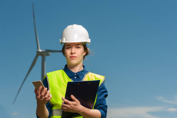 istock Concept of engineers and windmills 1010482290
