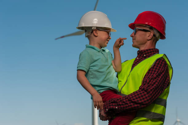 istock Concept of engineers and windmills 1010482800