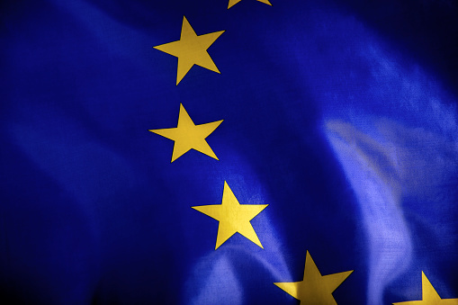 3D rendering of abstract European Union flag and golden stars with one out