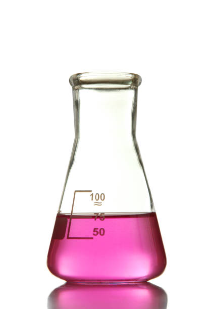 Laboratory flask with pink chemicals isolated on white background