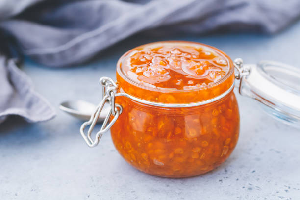 istock Glass jar with cloudberry jam. Nordic cuisine. 1010507680