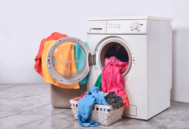 istock Clothes ready to wash with washing machine 1010508220