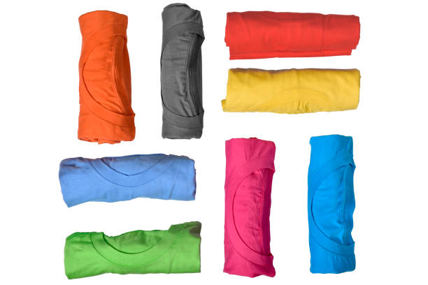 Set of colorful rolled clothes stock photo