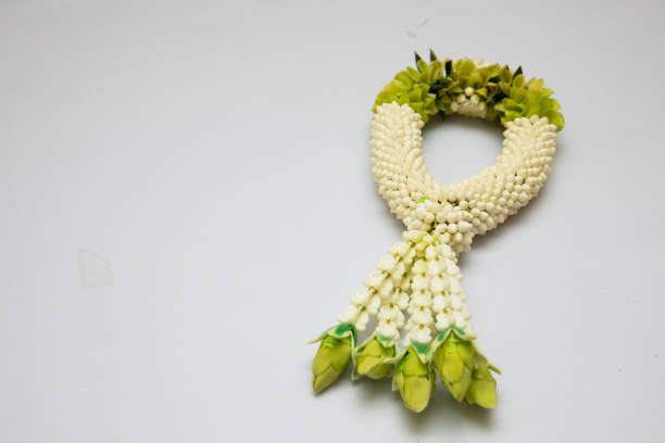 White and green Flower Thai garland on white background