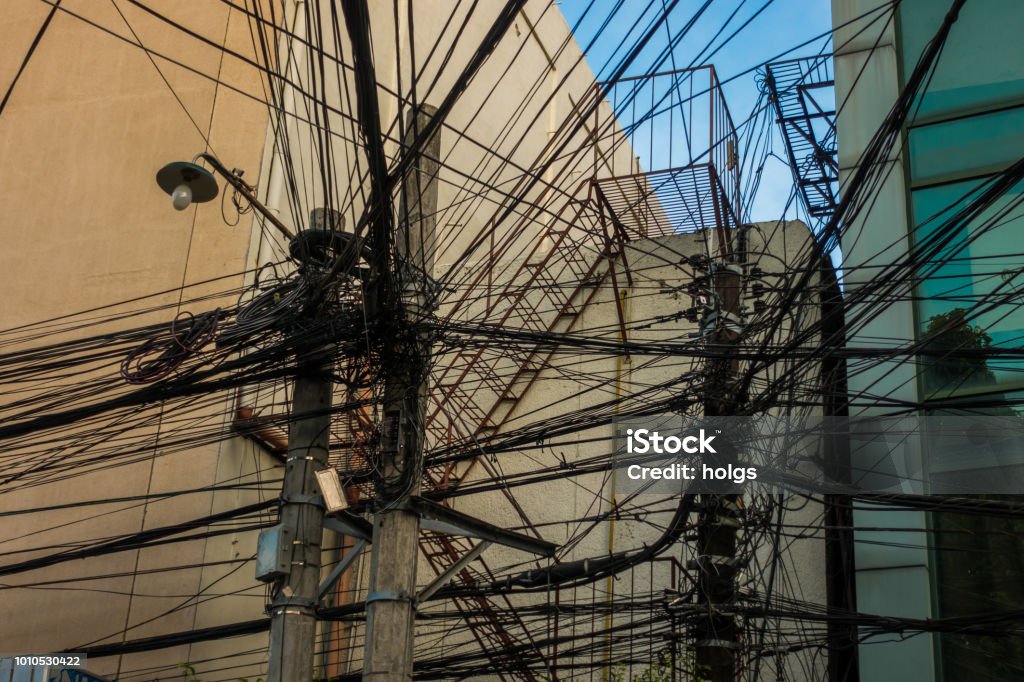 Cebu  area by day electric pole power line with messy cable in Cebu Cebu, Philippines - June 14, 2018: Cebu wide angle view  showing electric pole power line with messy cable in Cebu with nobody visible 2010-2019 Stock Photo