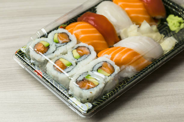 istock High Angle View Of Sushi And Sashimi In Box On Table 1010538862