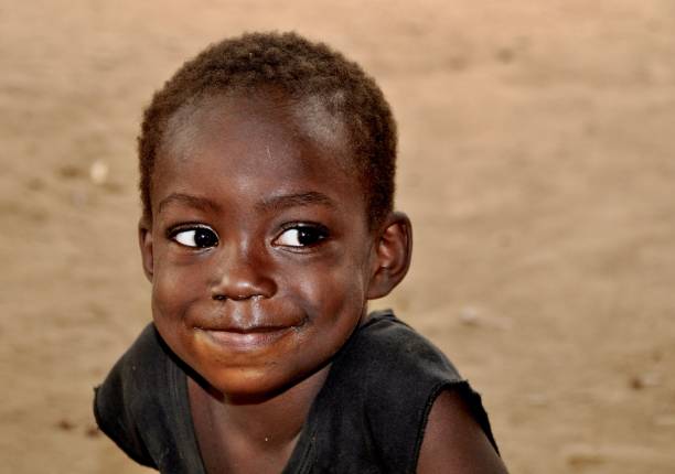 istock Close-Up Of Boy Looking Away 1010563760