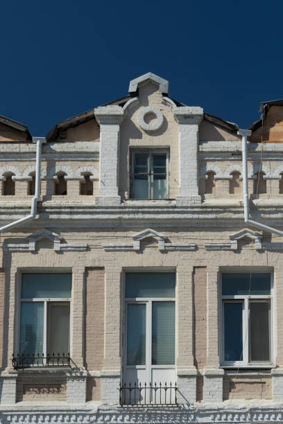 istock Urban landscape with an old building against a blue sky. 1010569366