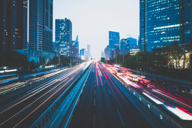 istock The abstract background of high speed road movement at night 1010570562