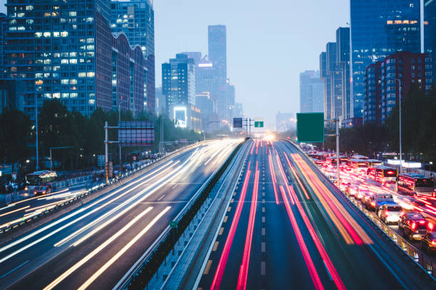 istock The abstract background of high speed road movement at night 1010572326