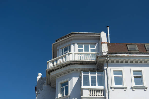 istock Urban landscape with an old building against a blue sky. 1010576008