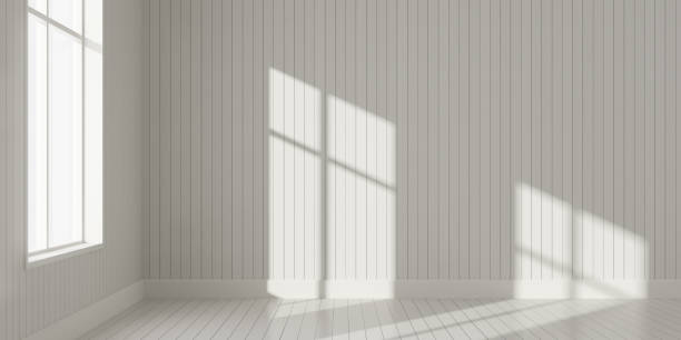 istock Stimulate scene of white empty room with sun light cast shadow on the laminate wood wall and plank floor,Perspective of minimal architecture. 3D rendering 1010576470